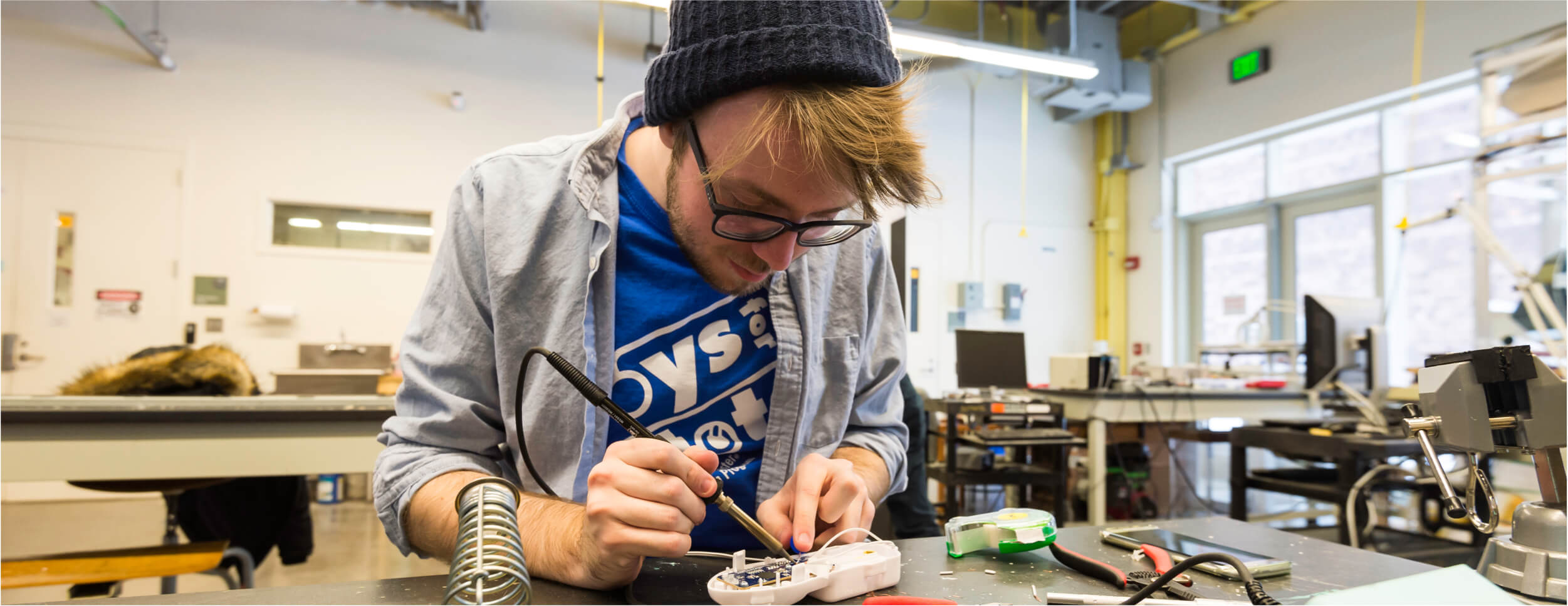 Student researcher in a laser lab