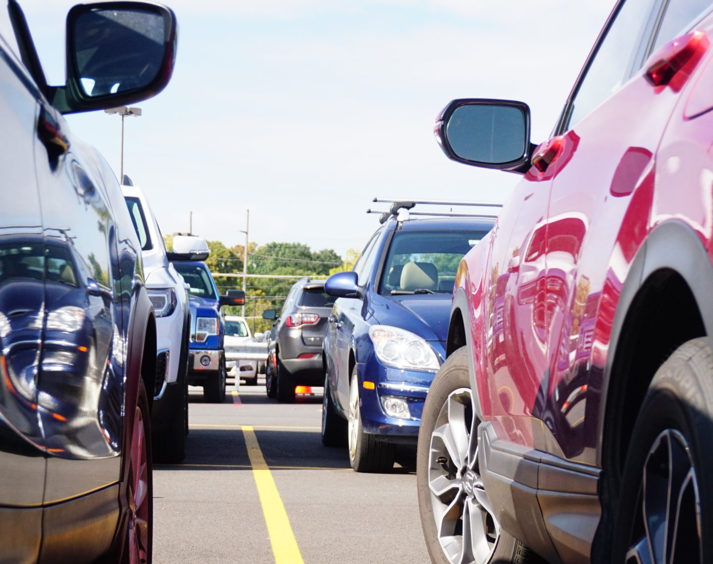 Close up of vehicles parked in lot