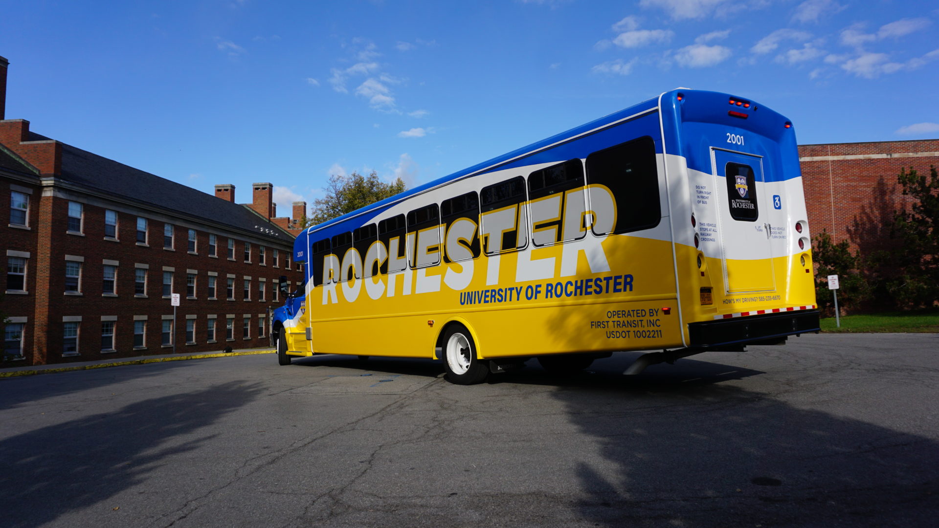 UR shuttle bus with new blue and yellow wrap