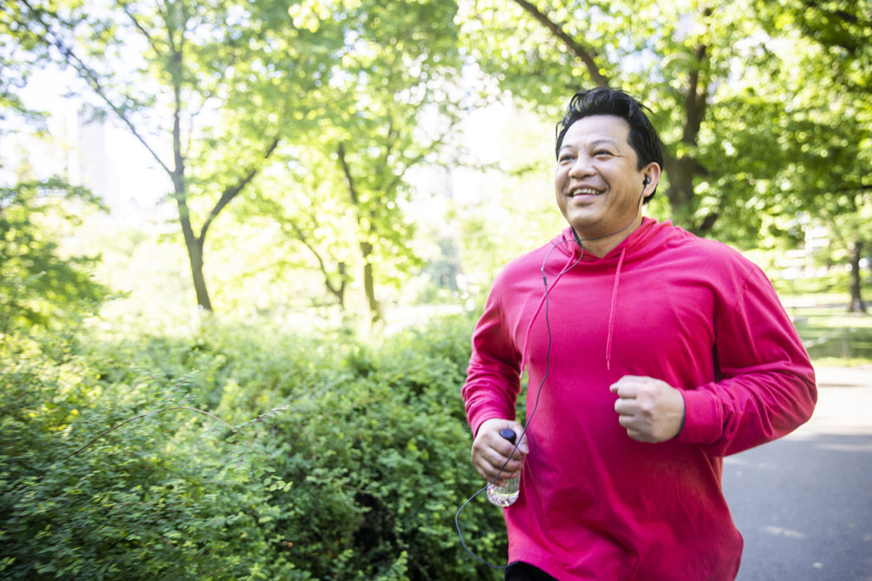 man jogging in a park