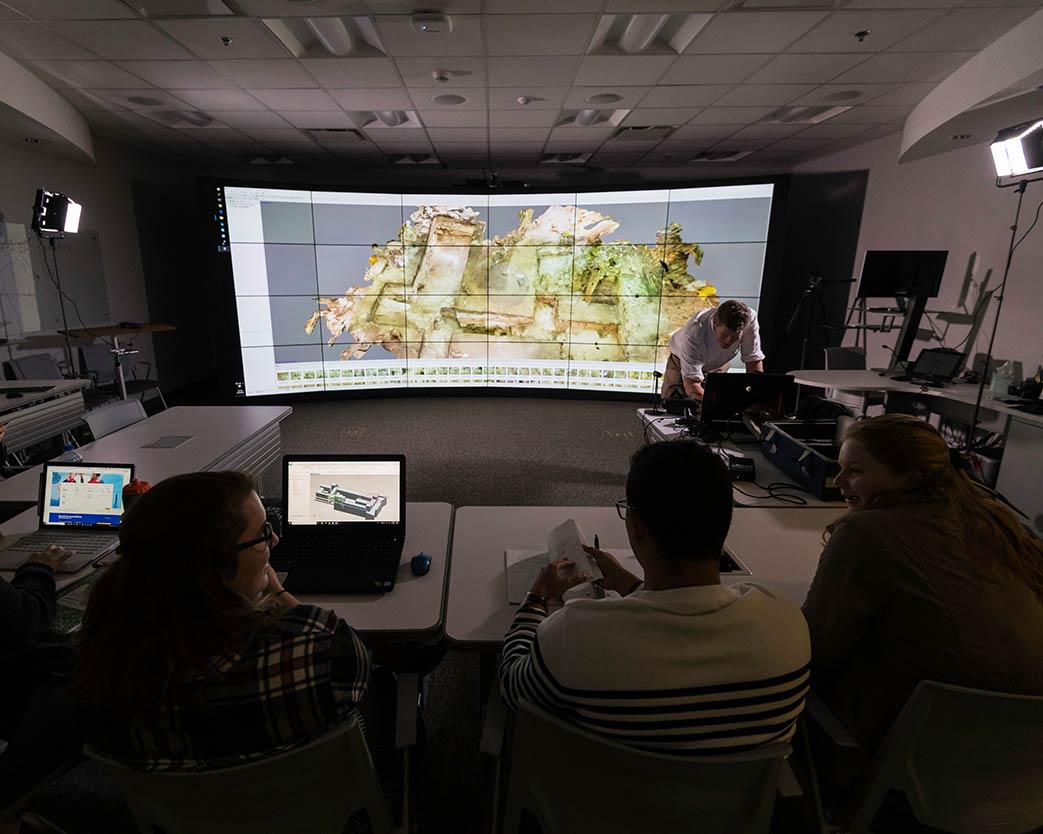Classroom with a huge floor-to-ceiling curved data display